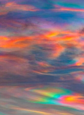 an image of nacreous, iridescent clouds